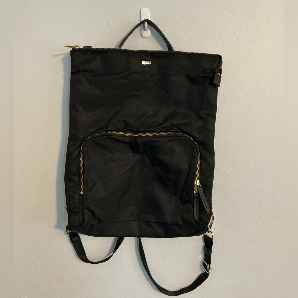 Epic Black Backpack with Gold Embellishments.